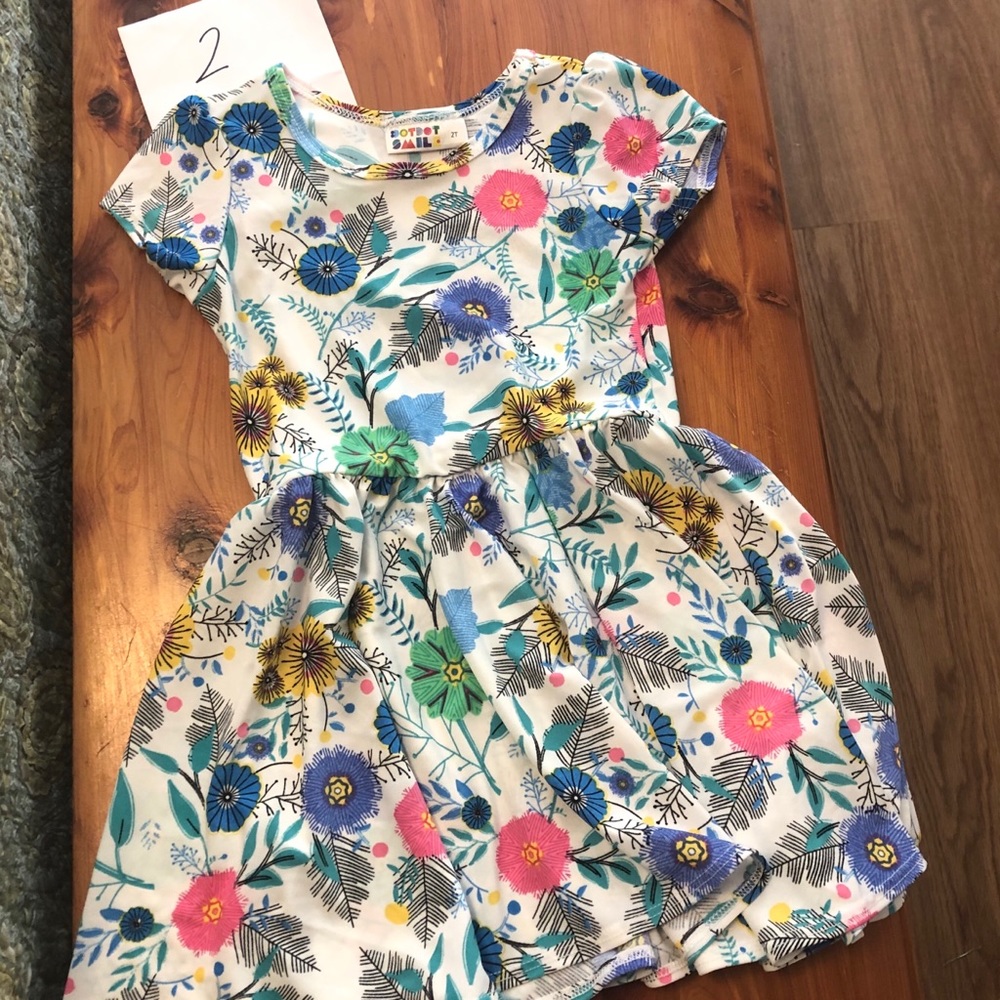 Like new DDS floral cap size 2